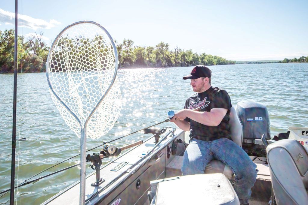 Close-up of a bottom bouncing rig in action, showing technique used by Canadian river fishers