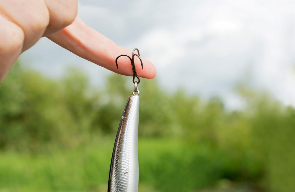 Comparison of Mustad, Gamakatsu, and VMC fishing hooks, highlighting design and quality differences for anglers in Canada