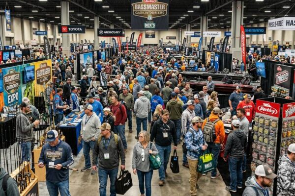 Crowds of fishing fans browsing exhibitor booths at the Bassmaster Classic Outdoors Expo