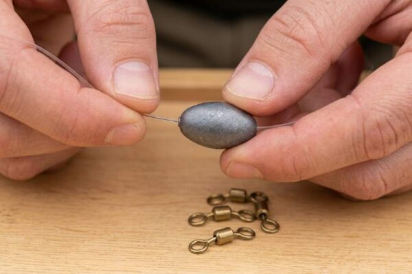 AMYSPORTS egg lead fishing weight threaded onto fishing line